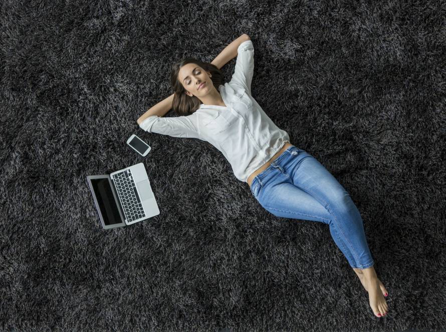 Woman laying on the carpet
